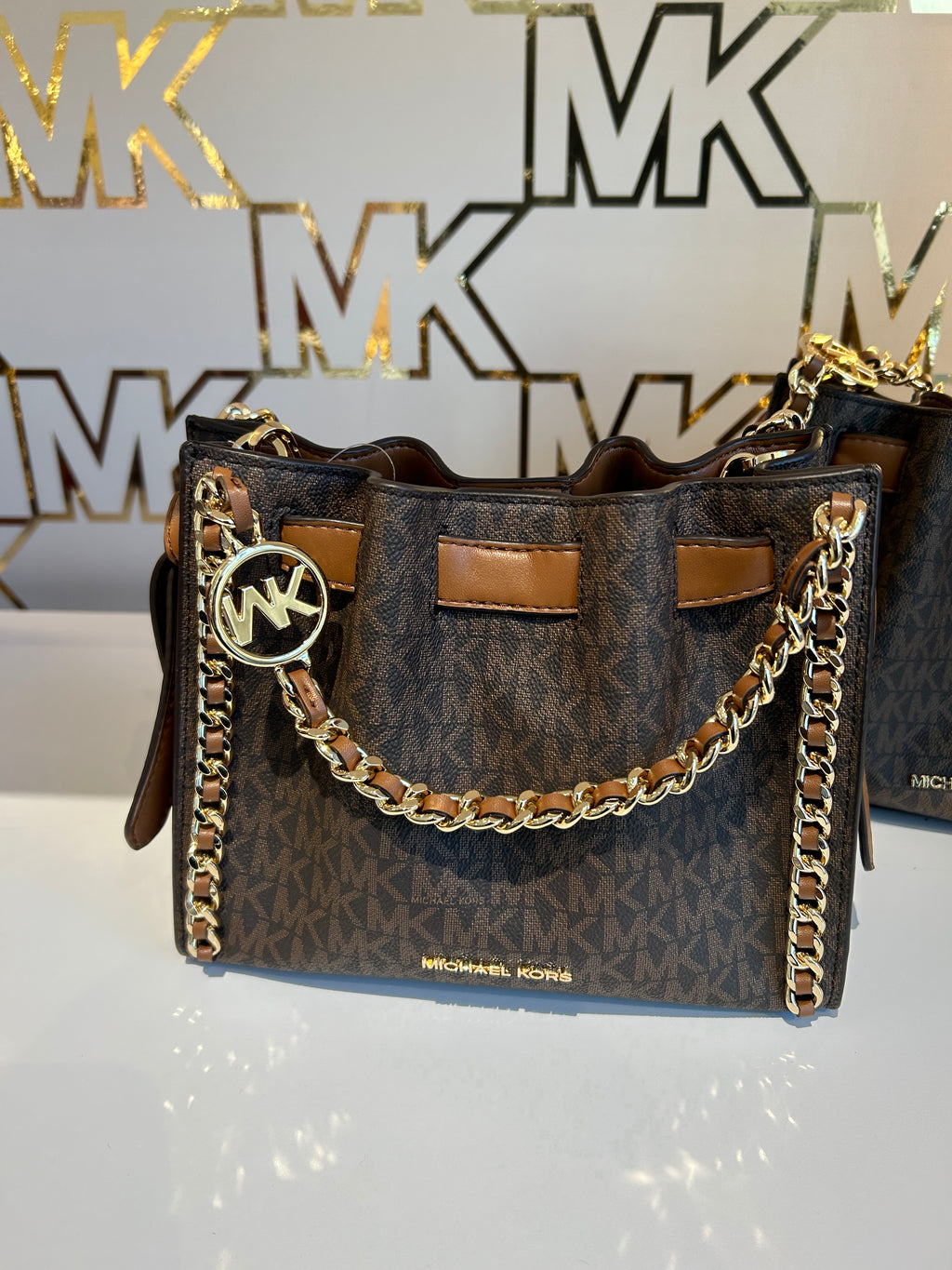 Michael Kors on X: Get a handle on it: new Mina bags are here