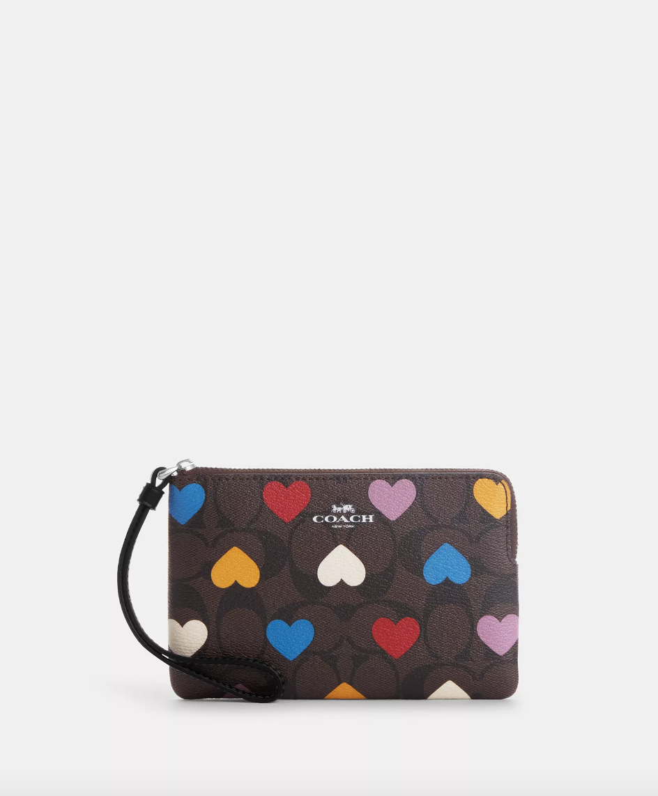 Load image into Gallery viewer, Coach Corner Zip Wristlet In Signature Canvas With Heart Print Brown Black Multi (Pre-Order)

