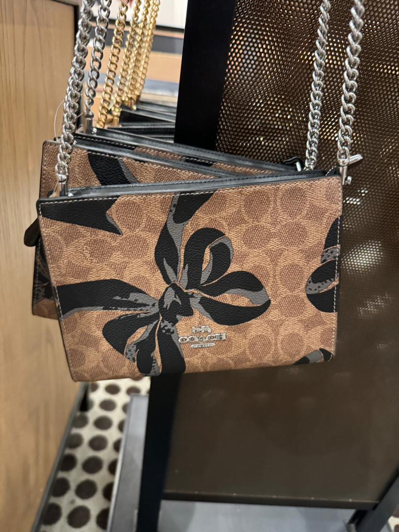 Coach Slim Crossbody Bag In Signature Canvas With Bow Print In Tan Black Multi (Pre-Order)