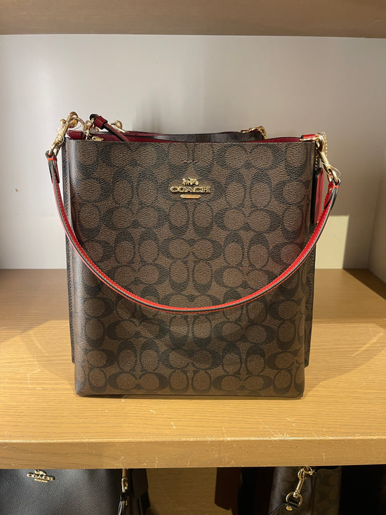 Load image into Gallery viewer, Coach Mollie Bucket Bag In Signature Brown 1941 Red (Pre-Order)
